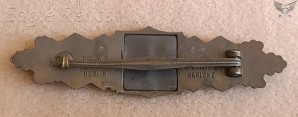 Maker marked Close Combat Clasp in bronze image 2