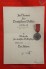 Social welfare citation and medal image 1