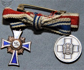 Miniature Bronze Mother Cross together with Social Welfare Medal image 1